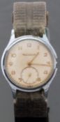 Jaeger LeCoultre gentleman's stainless steel wristwatch with gold hands and Arabic numerals,
