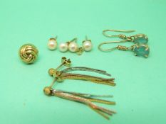 Three pairs of 9ct gold earrings,