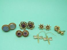 Two pairs of 9ct gold earrings set with amethysts,