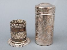 A Gorham or similar white metal travelling pepper or sugar caster with pull off lid marked sterling