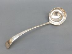 A hallmarked silver ladle, London 1900, maker Josiah Williams and Co, also marked 'Waterhouse',