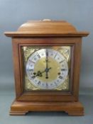 A German c1970 mahogany cased mantel clock, the movement by Kleninger,