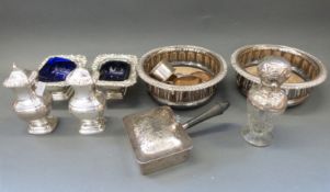 Four hallmarked silver napkin rings, weight 65g, silver-mounted atomiser, plated wine coasters,