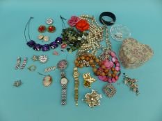 A collection of costume jewellery to include faux pearls, 9ct gold cameo brooch,