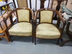A pair of late 19thC/early20thC inlaid upholstered tub chairs