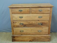 A pine chest of two over three drawers (W106 x D42 x H98cm)