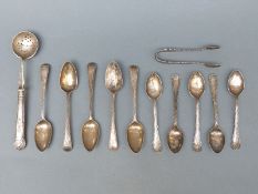 A quantity of hallmarked silver cutlery comprising a set of five teaspoons and another set of five