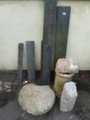 A damaged staddle stone,