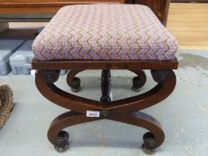 A 19thC mahogany cross frame stool.