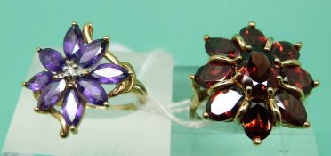 A 9ct gold ring set with garnets and a 9ct gold ring set with amethysts (size P/ Q)