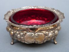 A Victorian hallmarked silver bon bon dish with ruby glass liner,