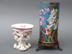 A 19thC German figural bon bon dish with hand decorated interior decoration of a lake and boat