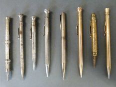 A collection of vintage pens and pencils including a hallmarked silver Yard-o-Led example
