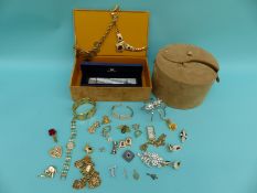 A collection of costume jewellery including animal brooches, Franklin Mint watch,