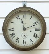 An early 20thC brass and painted metal cased ship's bulkhead timepiece,