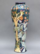 A Moorcroft vase limited edition 234/250 in the Tree Bark Thief pattern dated 95,