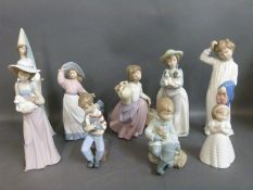 A collection of boxed Nao child and female figures