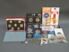 A quantity of Royal Mint coins and sets, modern crowns, ten shillings note, sundry coins etc.