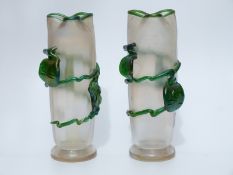 A pair of Kralic style iridescent glass vases with applied decoration and pinched necks