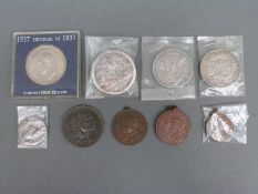 A small collection of coins and medallions to include 1880 Morgan dollar, 1926 Liberty peace dollar,