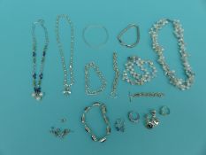 A collection of silver jewellery to include amethyst bracelet, pearl necklace and bracelet,