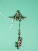 A Victorian brooch in the form of two monkeys set with paste