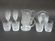 A set of 12 cut glass tumblers,