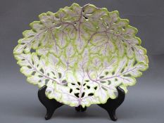 An 18thC Longton Hall soft paste porcelain relief moulded pierced oval dish, 1755-60,