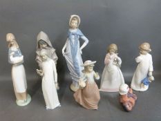 Eight boxed Nao figures,