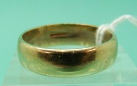 A 9ct gold wedding band, 4.