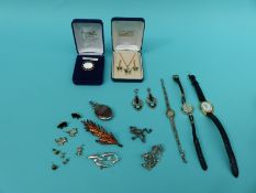 A collection of costume jewellery including gold earrings, hardstone silver pendant,