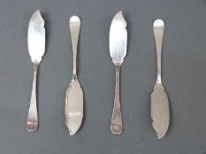 Four various hallmarked silver butter knives, Sheffield 1895, 1896 and two 1897, length 11.