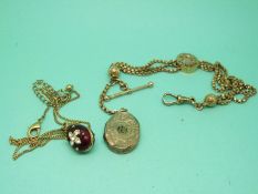 A Victorian gold plated ladies fob chain with plated locket and an enamel egg pendant