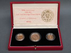A 500th Anniversary 1489-1989 gold proof sovereign three coin set comprising a double,