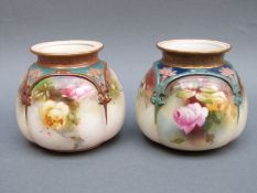 A near pair of Hadley's Worcester squat lobed vases decorated with roses, one marked Hadley's,