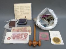 A collection of overseas and UK coins and bank notes,