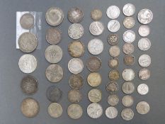 A cachet of mixed silver coinage including holed George II shilling and a holed George III sixpence,