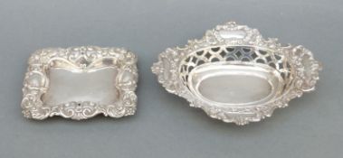 Two hallmarked silver embossed dishes,