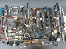 Over 80 various ladies and gentleman's wristwatches including Timex, Swatch, Casio, Seiko, Baby-G,