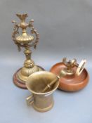 A 19thC bronze pestle and mortar, brass swivelling and rotating lamp,