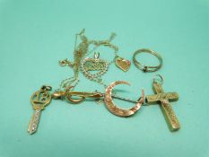 Two 9ct gold crescent brooches, two 9ct gold pendants, a cross pendant with a stanhope,