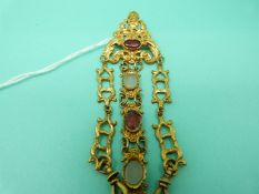 A gilt chatelaine set with agate cabochons with foliate design and a small plated purse