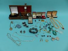A collection of costume jewellery to include Butler and Wilson earrings,