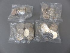 Four sealed bags of Squirrel Nutkin 50 pence uncirculated coins,