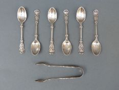 A set of six Art Nouveau style hallmarked silver teaspoons and matching tongs, Sheffield 1908,