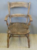 An elm seated elbow chair