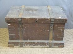 A 19thC metal bound stained pine silver chest/trunk with metal looped handles,