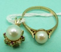A 9ct gold ring set with a pearl and a 14k gold pendant set with a pearl surrounded by rubies and