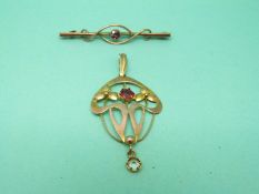 A 9ct gold Art Nouveau pendant and a 9ct gold brooch