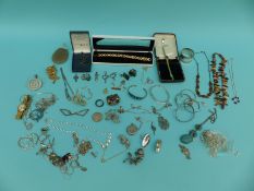 A collection of silver jewellery to include necklaces, bracelets, earrings, rings, marcasite brooch,